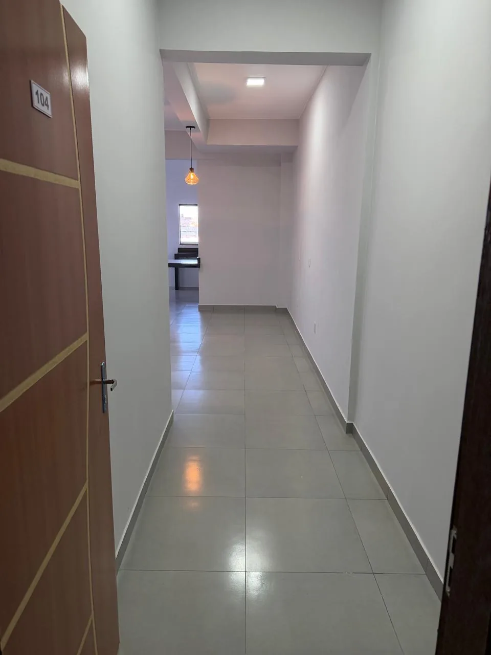 Corredor interno do apartamento